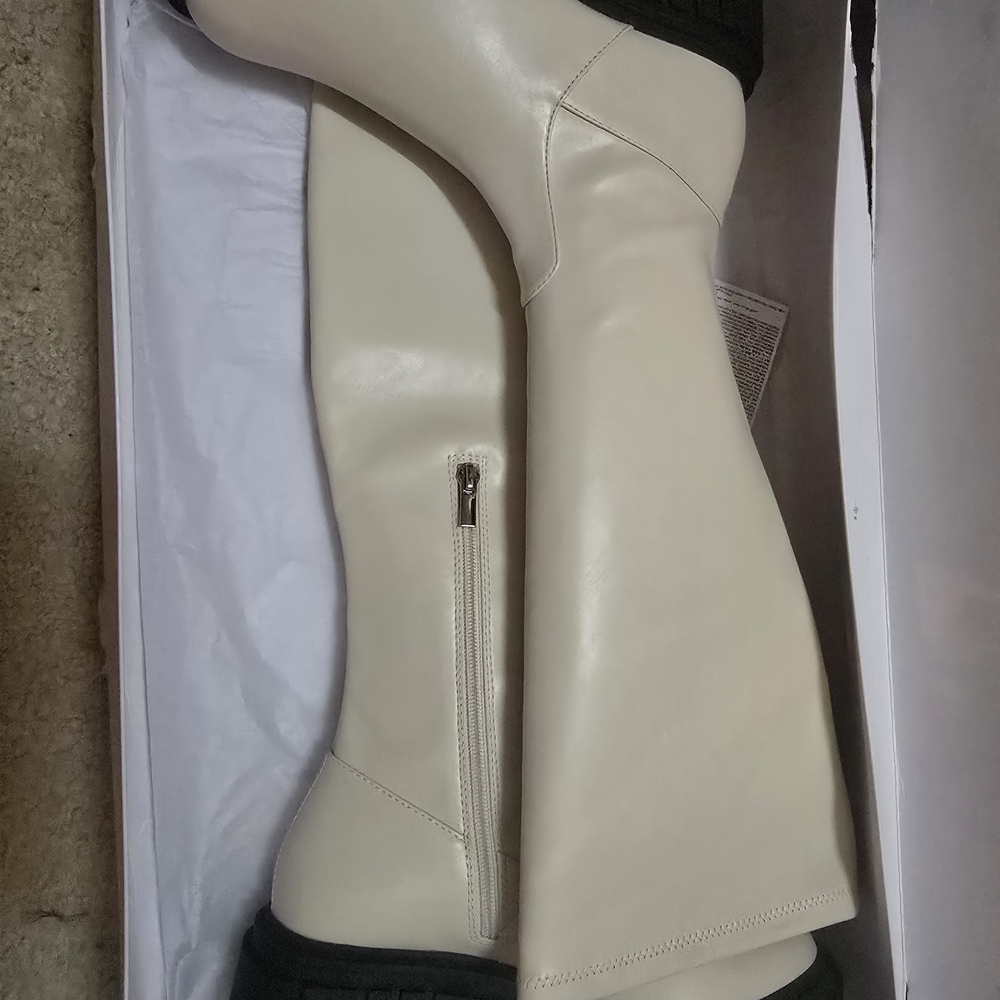 The DROP. Elegant Cream Heeled Boots.